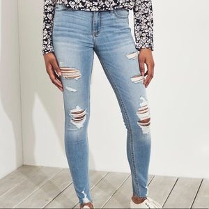 ripped medium wash skinny jeans